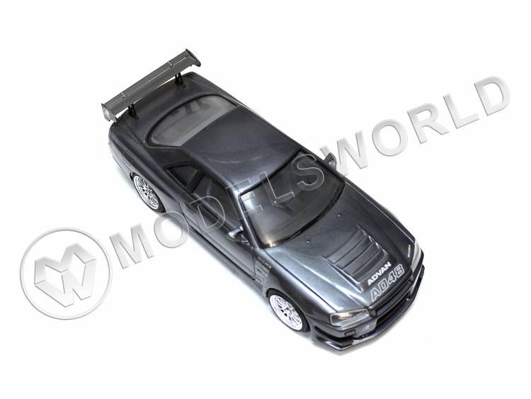Готовая модель автомобиля Nissan Skyline GT-R R34 в масштабе 1:24 - фото 1